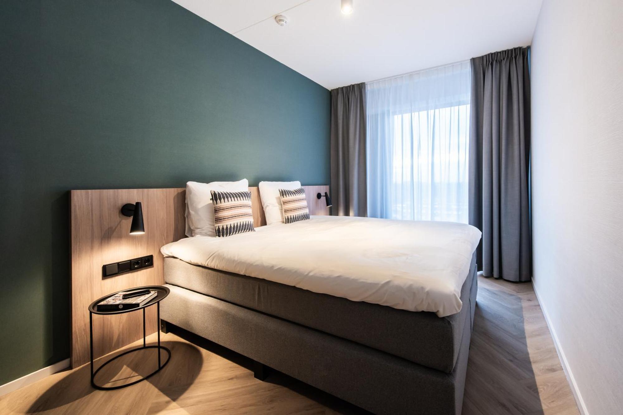 Апарт отель Numa Amsterdam Docklands Экстерьер фото